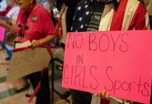 Enraged parents scream at school board for allowing trans athlete in girls’ sports: ‘Teach them self control!’